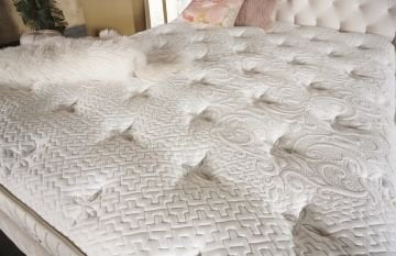 Fluffy beige Boxspring bed